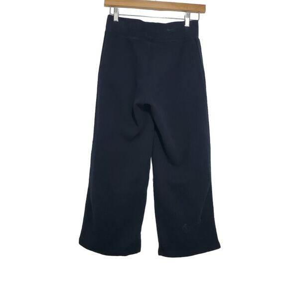 Nike | Ribbed Wide Leg Cropped Athletic Knit Pants with Pockets and Drawstring - Picture 5 of 16